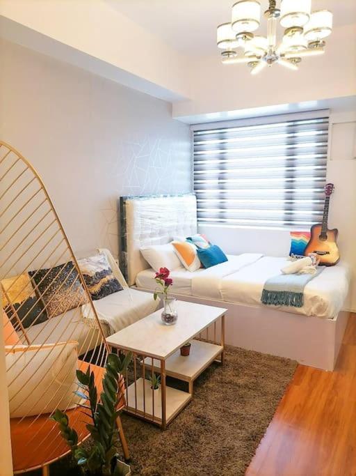 Cozy Studio Unit At Sun Residences Quezon City Buitenkant foto