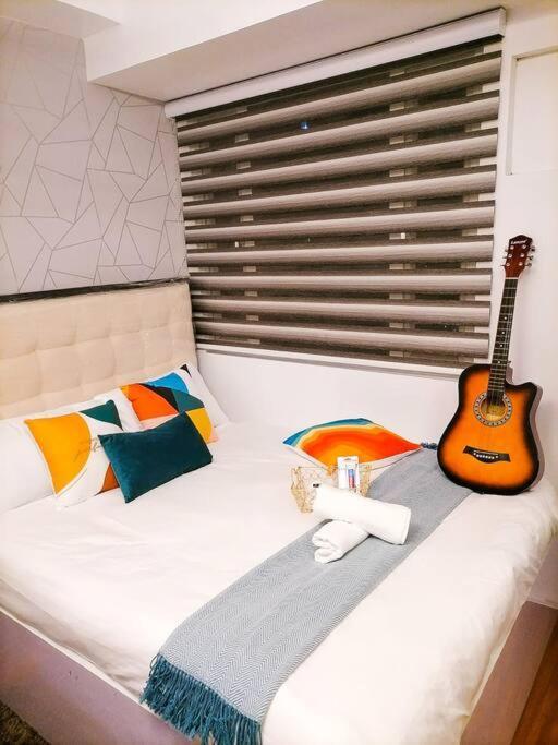 Cozy Studio Unit At Sun Residences Quezon City Buitenkant foto
