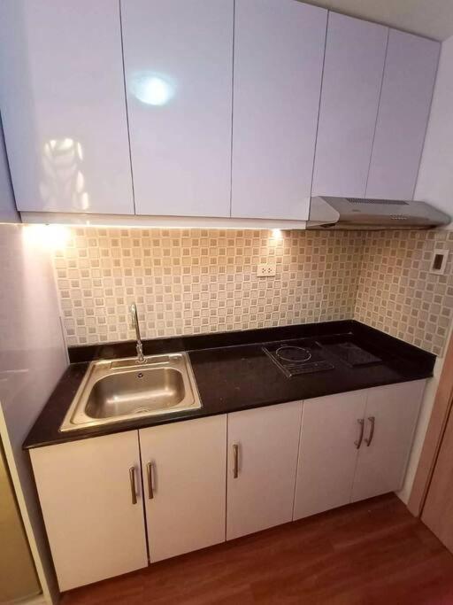 Cozy Studio Unit At Sun Residences Quezon City Buitenkant foto