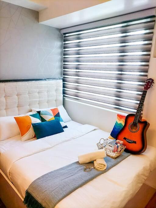 Cozy Studio Unit At Sun Residences Quezon City Buitenkant foto